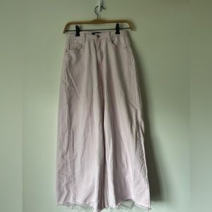 Cropped distressed wide legged jeans